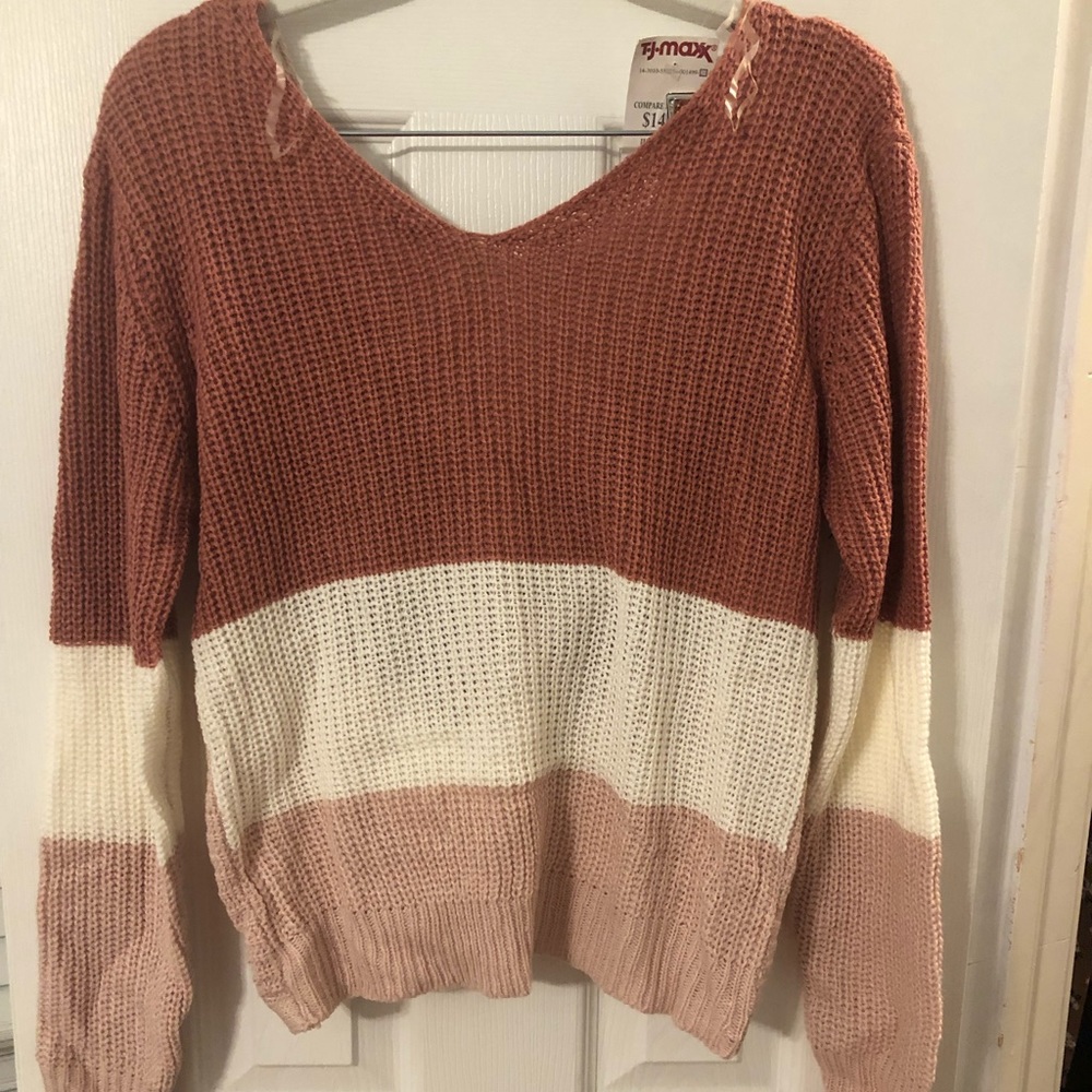 Boutique sweater with open back